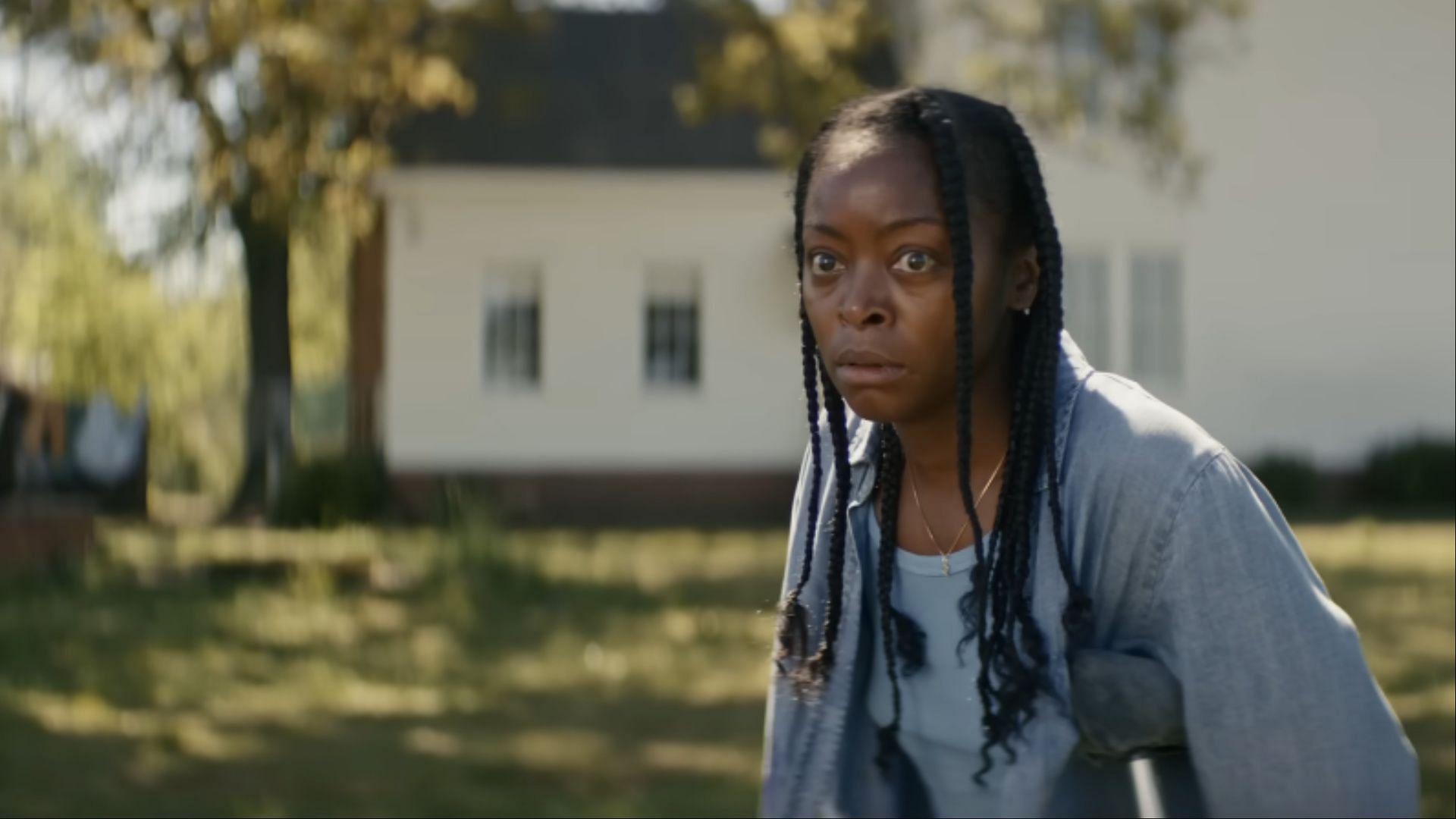 Ramona’s haunted expression in The Woman in the Yard captures her growing despair as reality begins to slip away. (Image via Universal/Youtube)